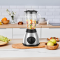 ARMPOWER 800W professional blender with high-speed blades for smoothies and ice crushing, shown with a sleek design and control panel.