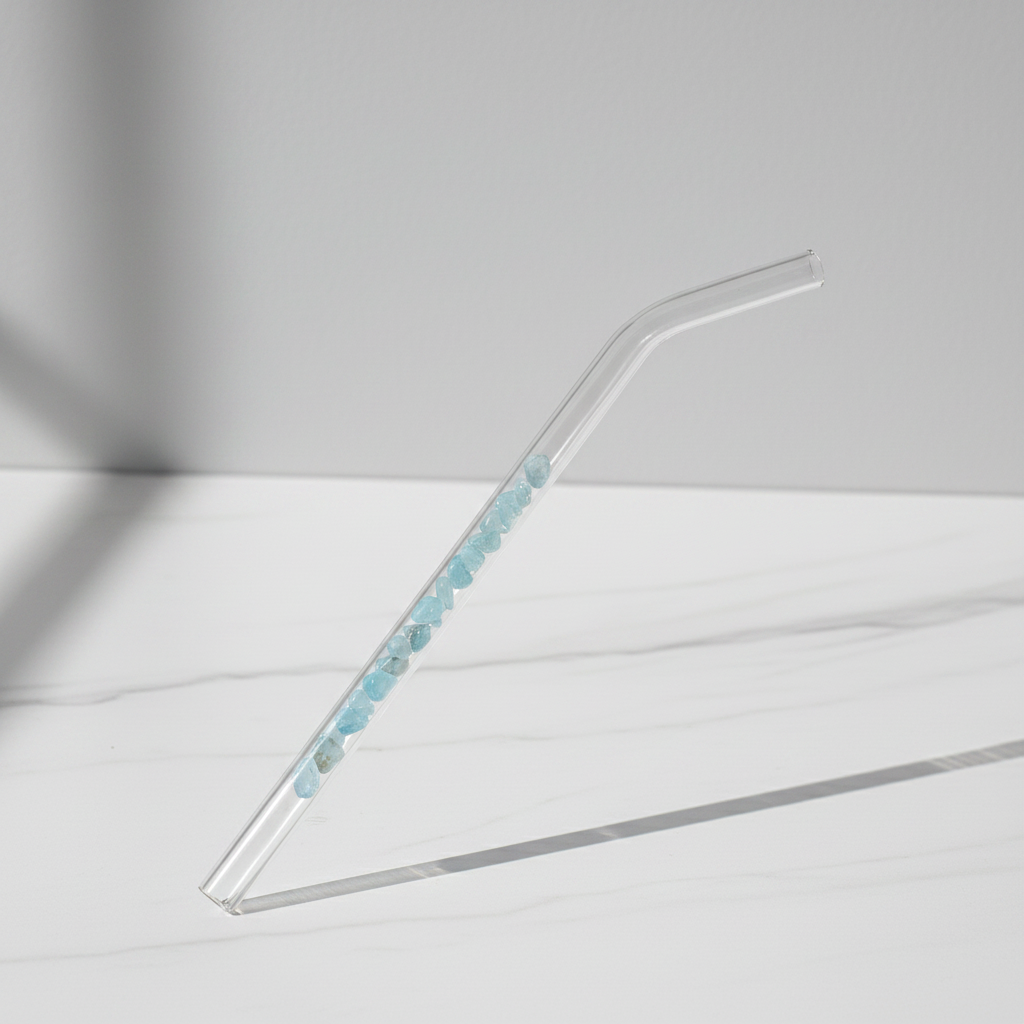 Aquamarine crystal glass reusable straw by ARMPOWER IN MY HANDS, designed for eco-friendly drinking and stylish presentation.