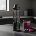 Black DailyBlend household blender by ARMPOWER IN MY HANDS, showing a compact multi-functional kitchen blender on a countertop.