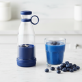Blue USB Juice Blender Cup by ARMPOWER IN MY HANDS, portable blender with a transparent container and blue lid for smoothies